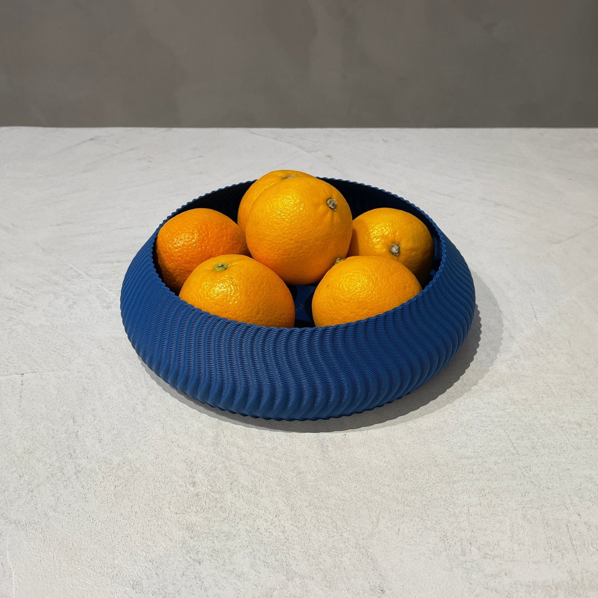 Kyma Bowl Cobalt With Fruit, 3D Printed Recycled Plastic, Deme Design #color_cobalt